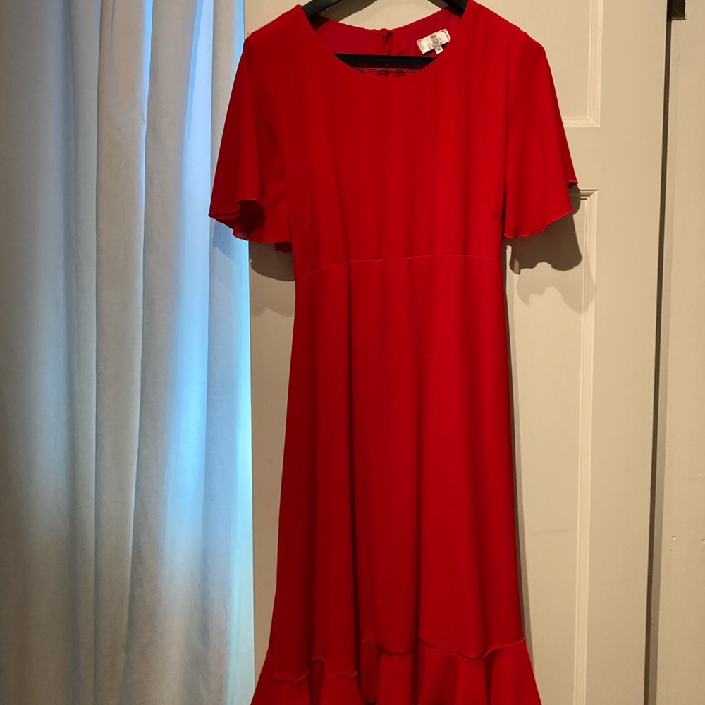 Red maternity dress with cape and flounce details!